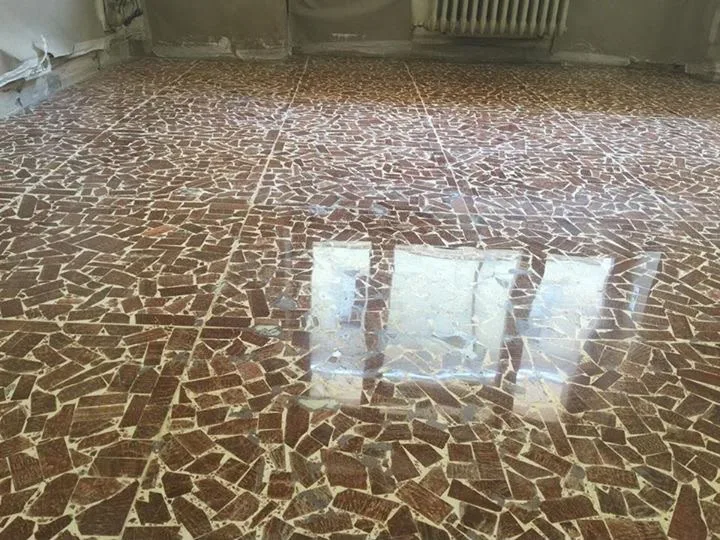 Palladiana (crazy-paving) marble floor after restoration and polishing