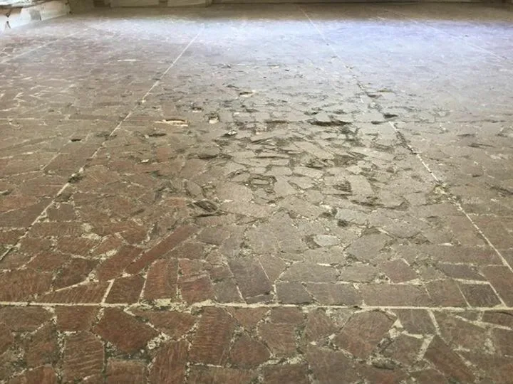 Palladiana (crazy-paving) marble floor before restoration and polishing