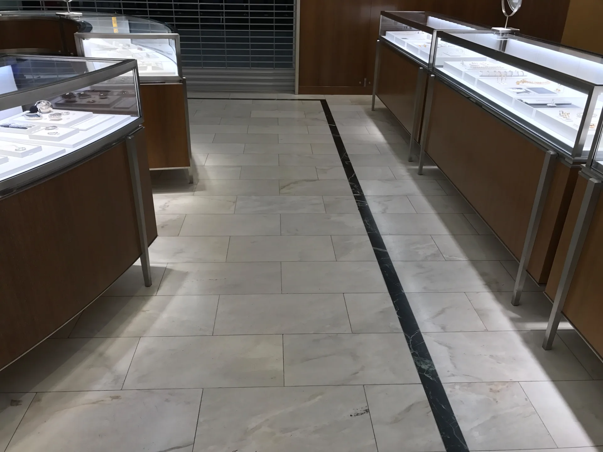 White marble retail floor after honing and polishing